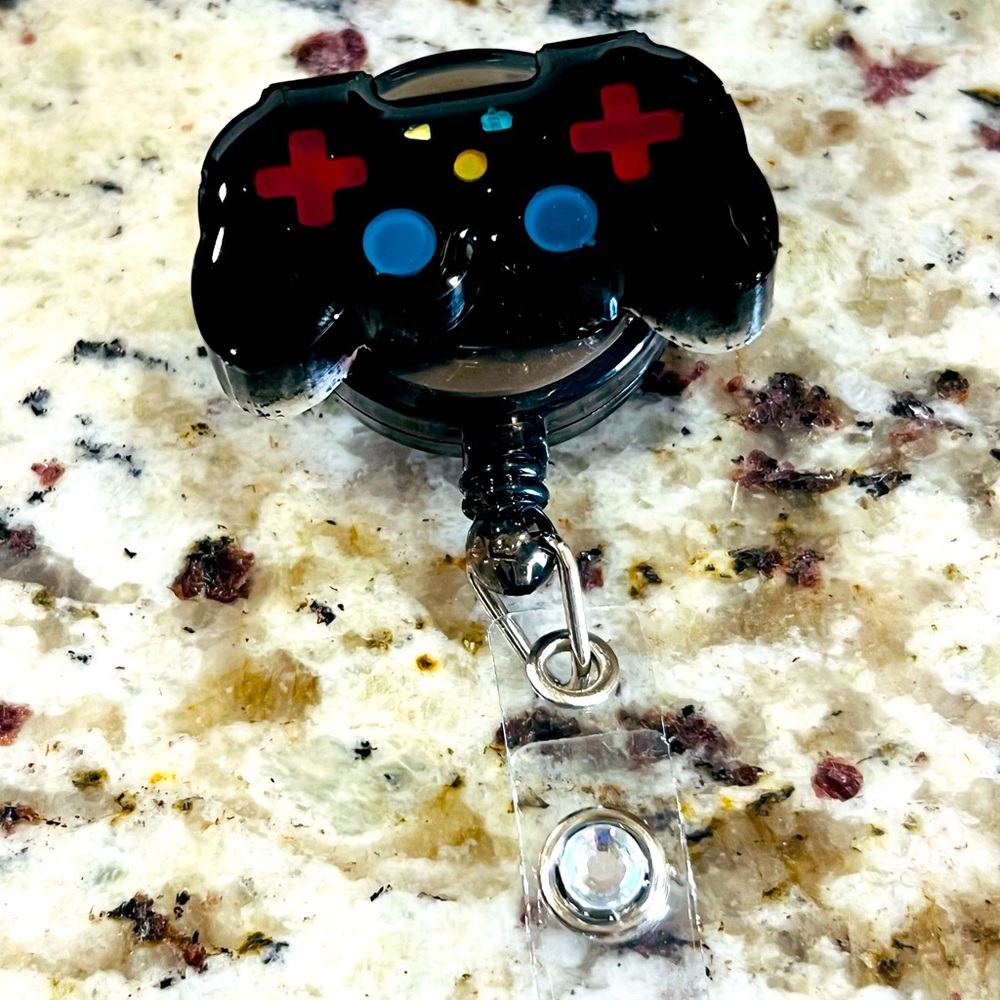 Gamer. Game controller. Dimoand badge reel.